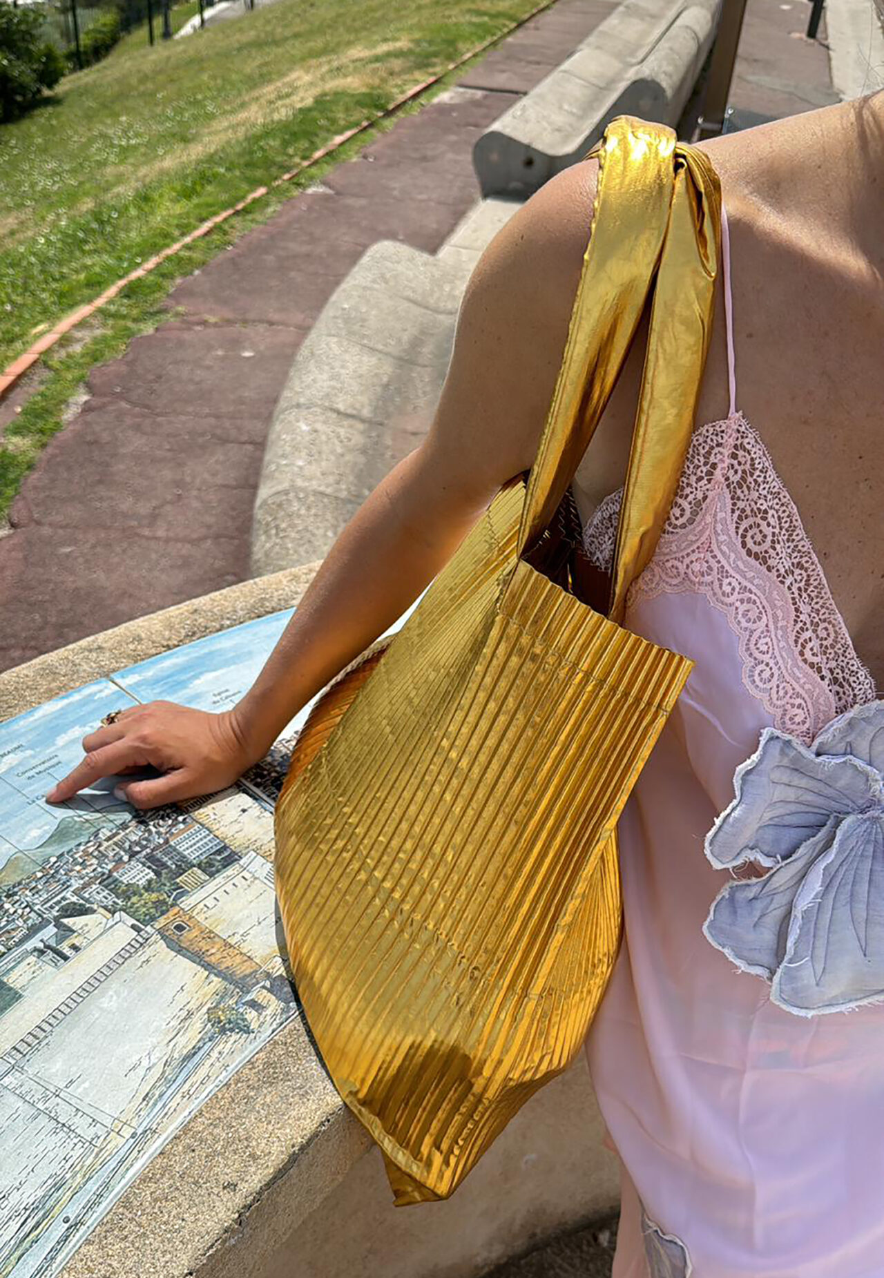 marios gold pleated tote bag